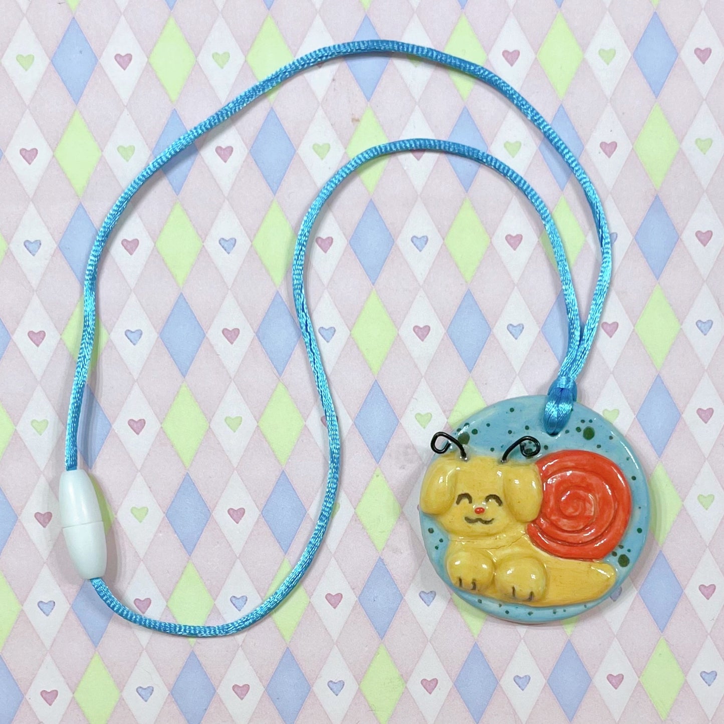 yellow & red snailpuppy kawaii ceramic stoneware necklace!