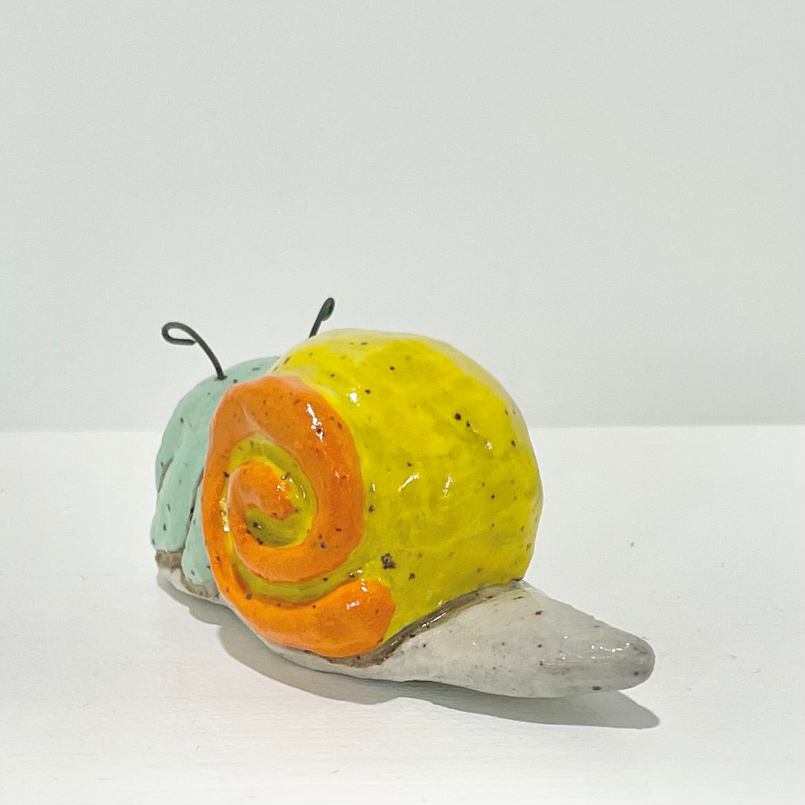 yellow teal snailgirl handmade ceramic stoneware figure!