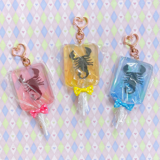 pink yellow blue scorpion lollipop fake candy creepy cute kawaii double sided transparent acrylic keychain! (3.5")