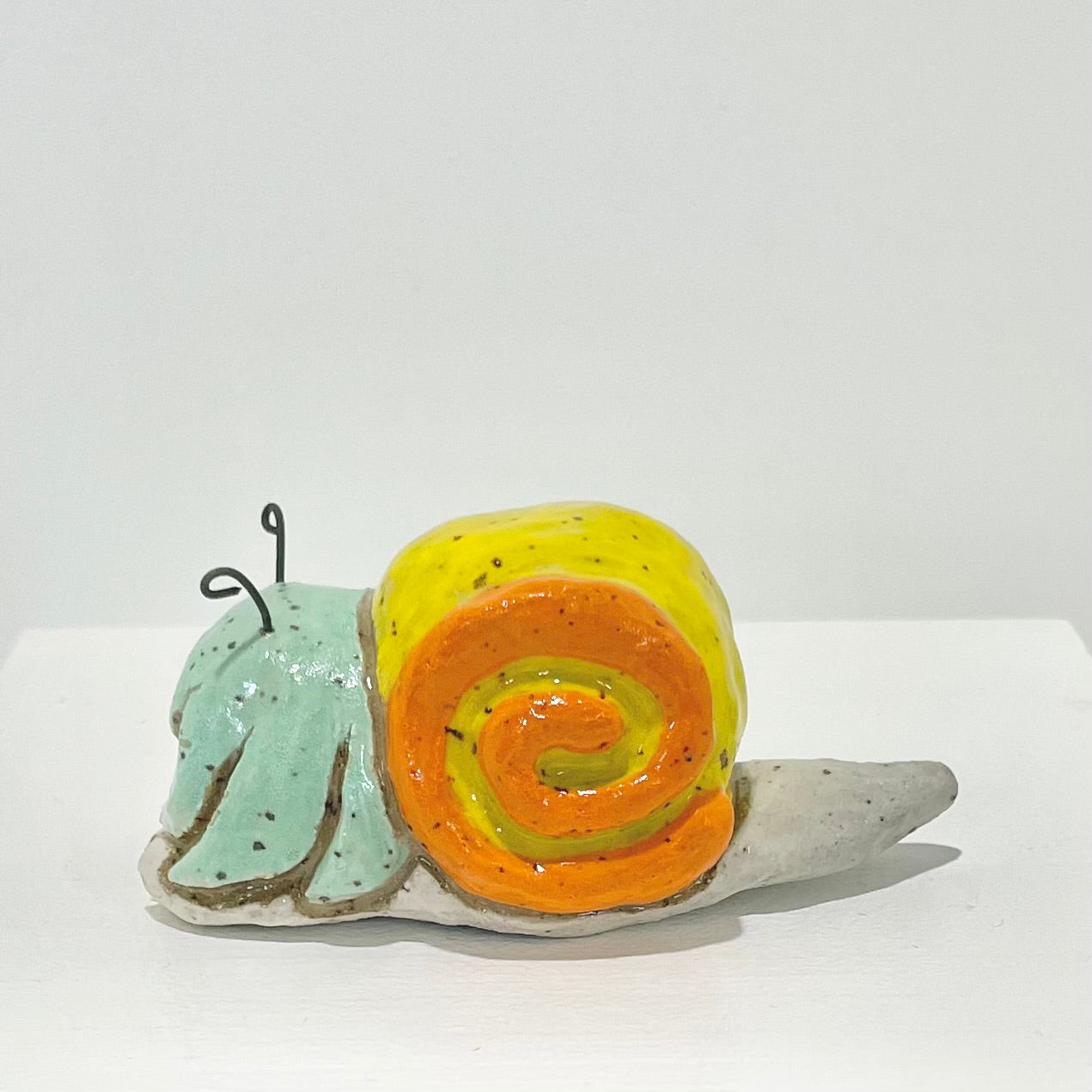 yellow teal snailgirl handmade ceramic stoneware figure!