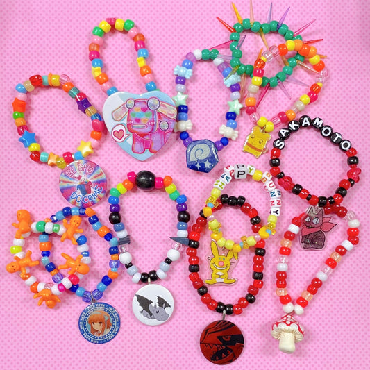 assorted 12 piece bulk handmade kandi bracelet set!