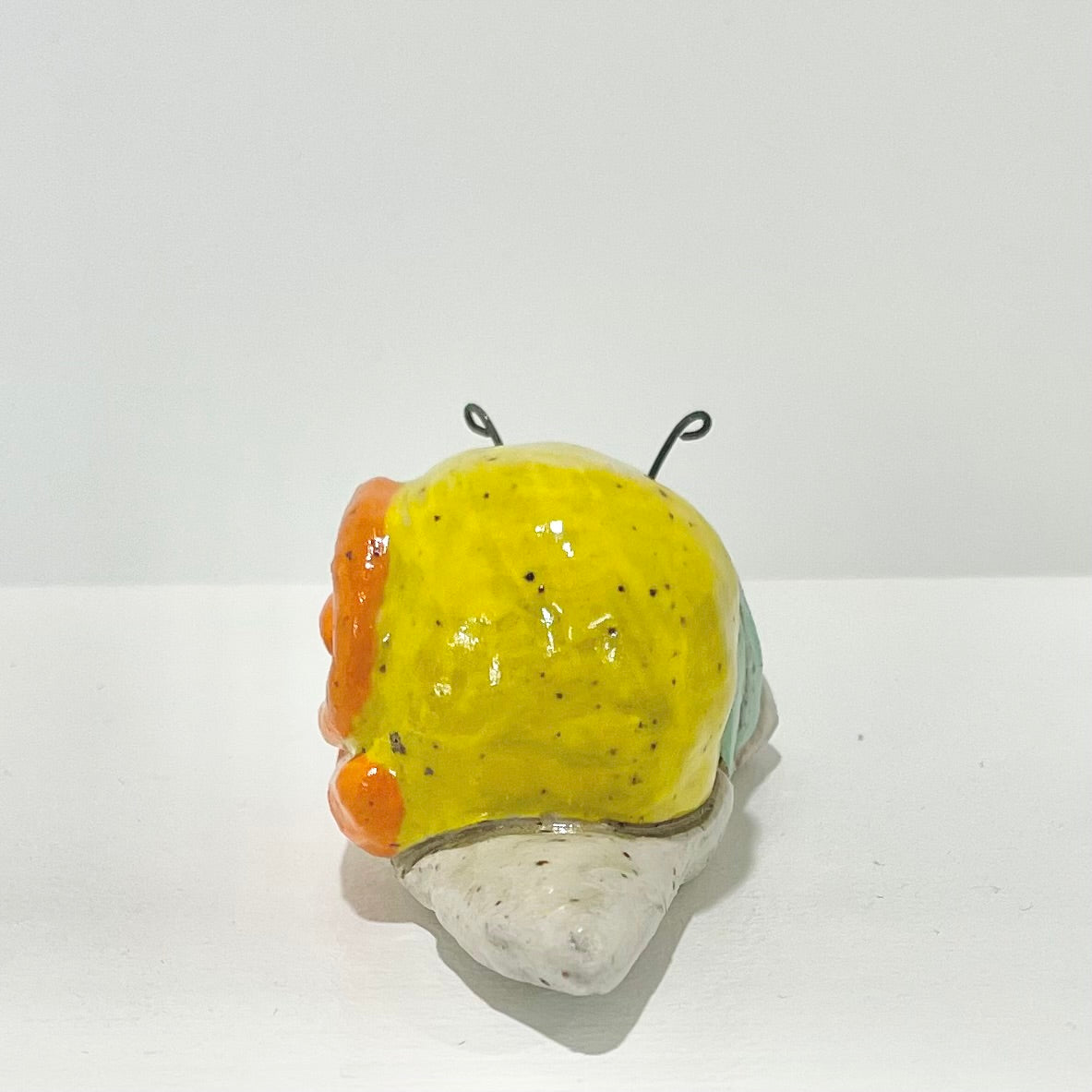yellow teal snailgirl handmade ceramic stoneware figure!