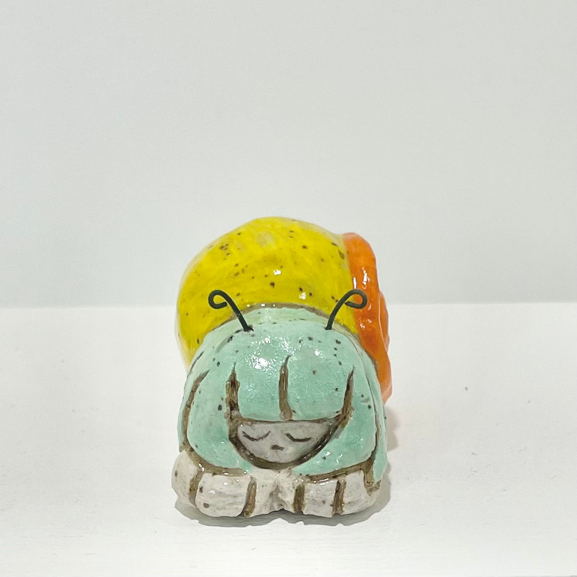 yellow teal snailgirl handmade ceramic stoneware figure!