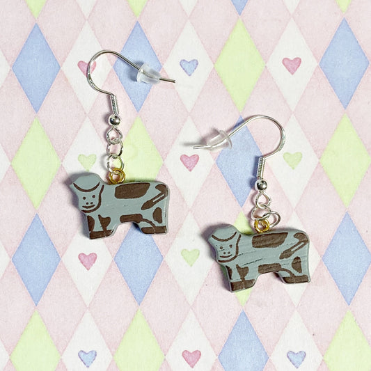 grey cow kawaii miniature painted wood pastel cottagecore dangle earrings!