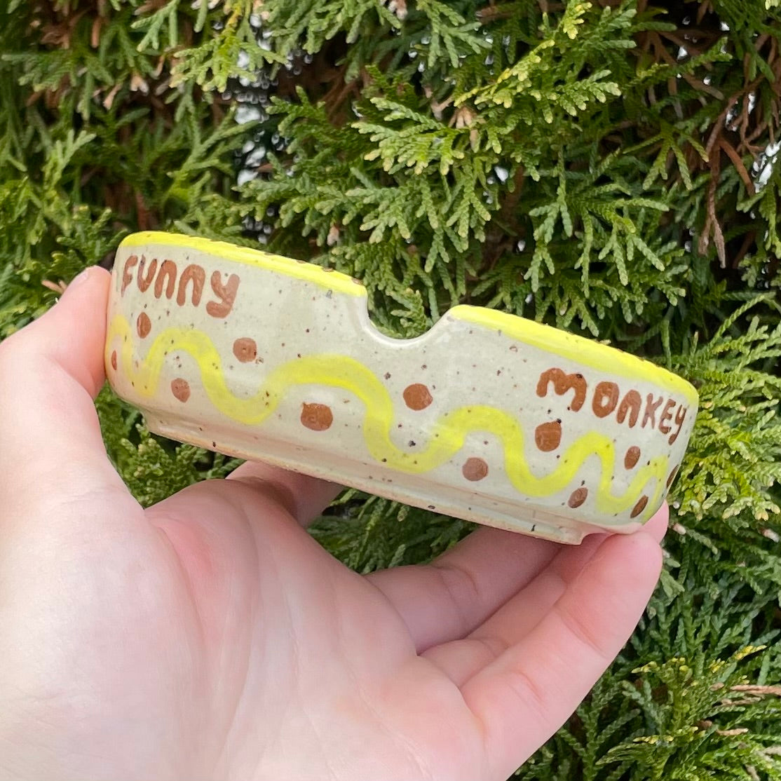 yellow monkey wheel thrown ceramic stoneware ashtray!