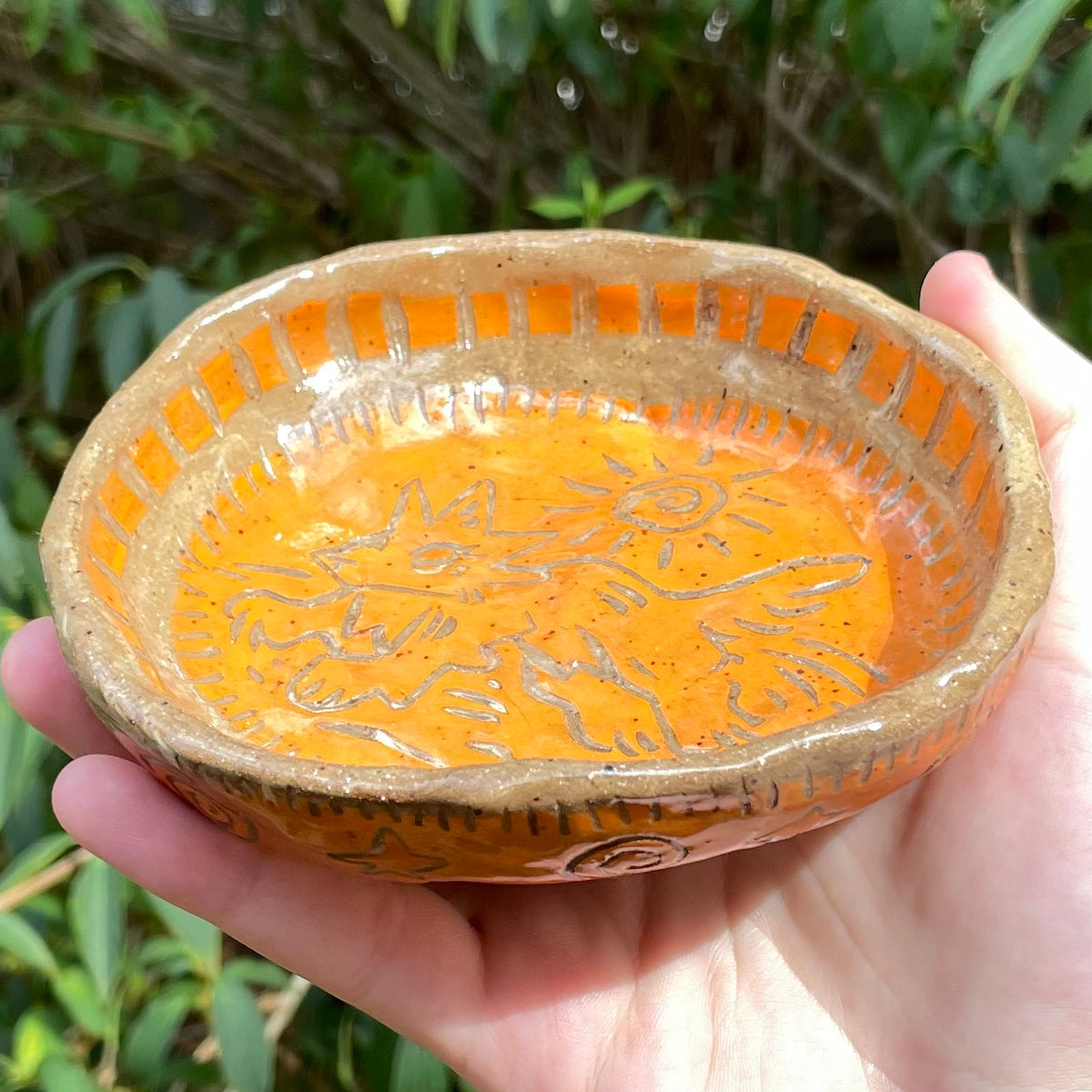 handmade carved orange wolf ceramic stoneware trinket dish!