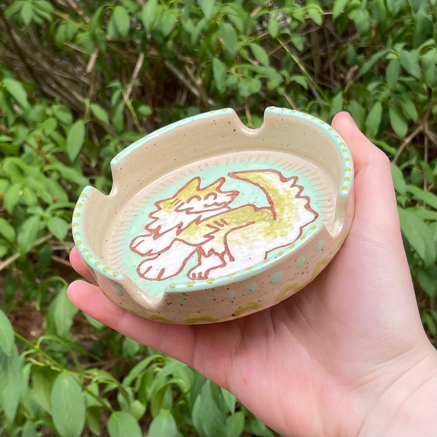 green wolf wheel thrown ceramic stoneware ashtray!